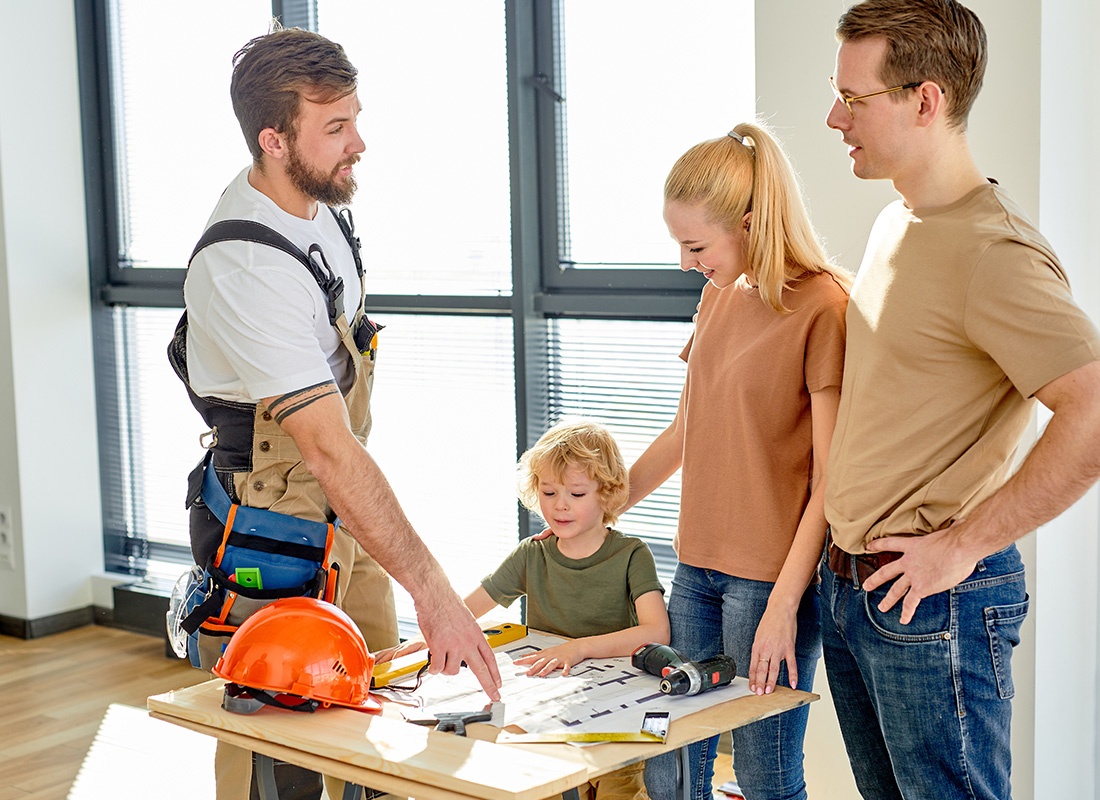 About Our Agency - Contractor Speaking With Family