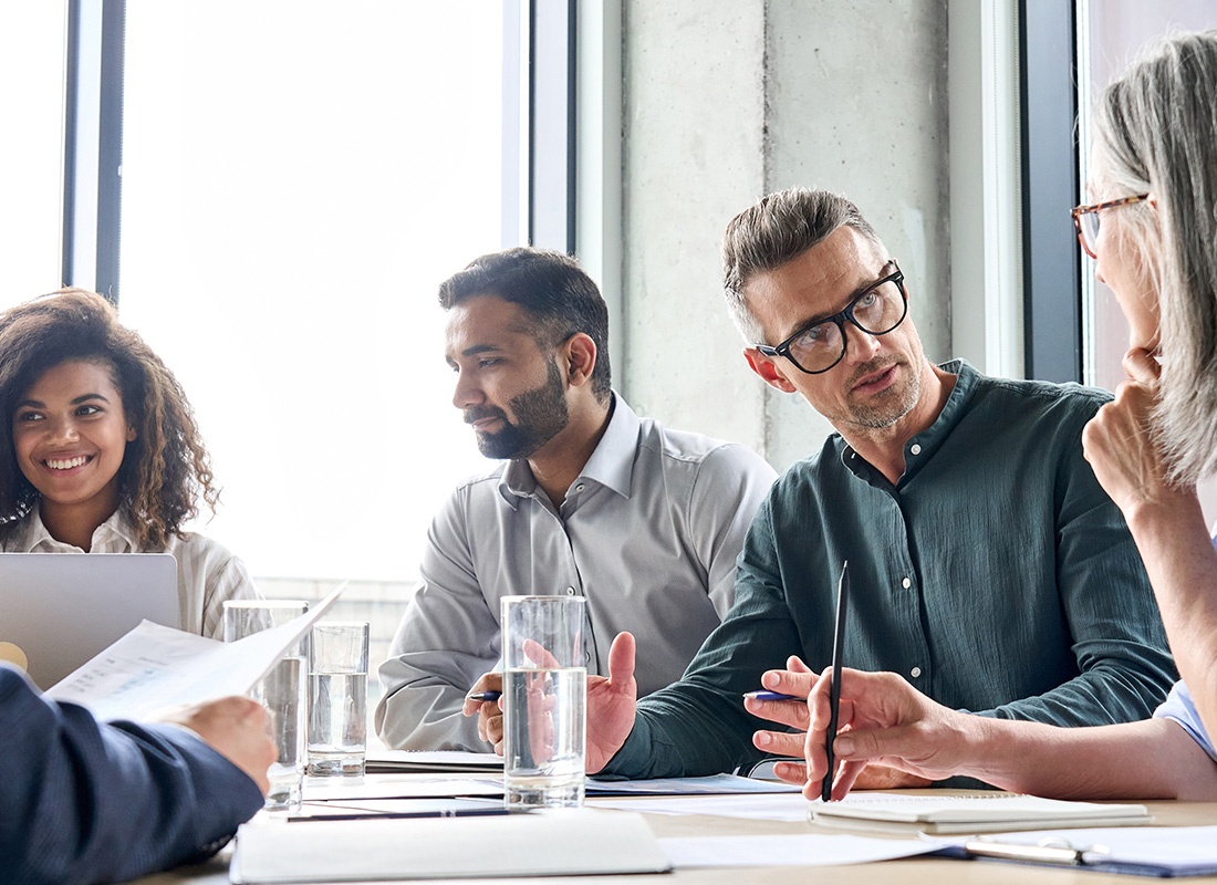 We Are Independent - Group of People Having a Meeting in an Office